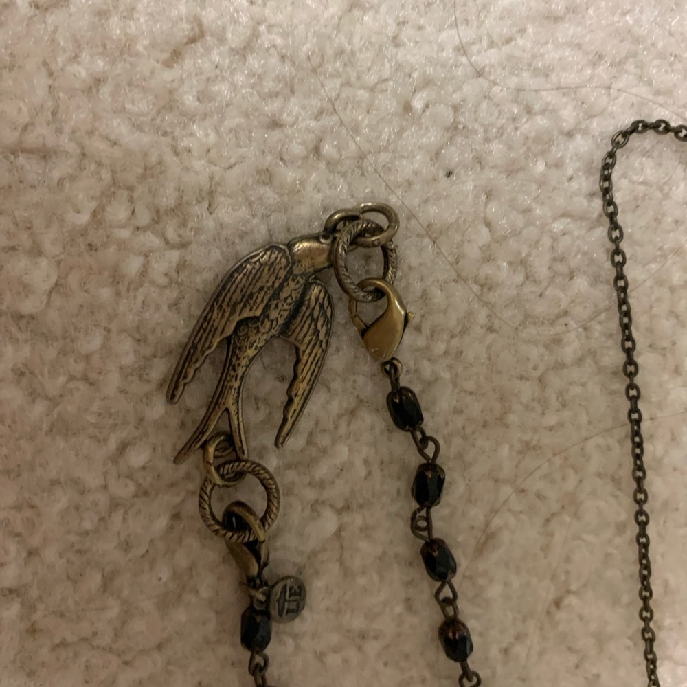 LE necklace; different adjustments with this one.